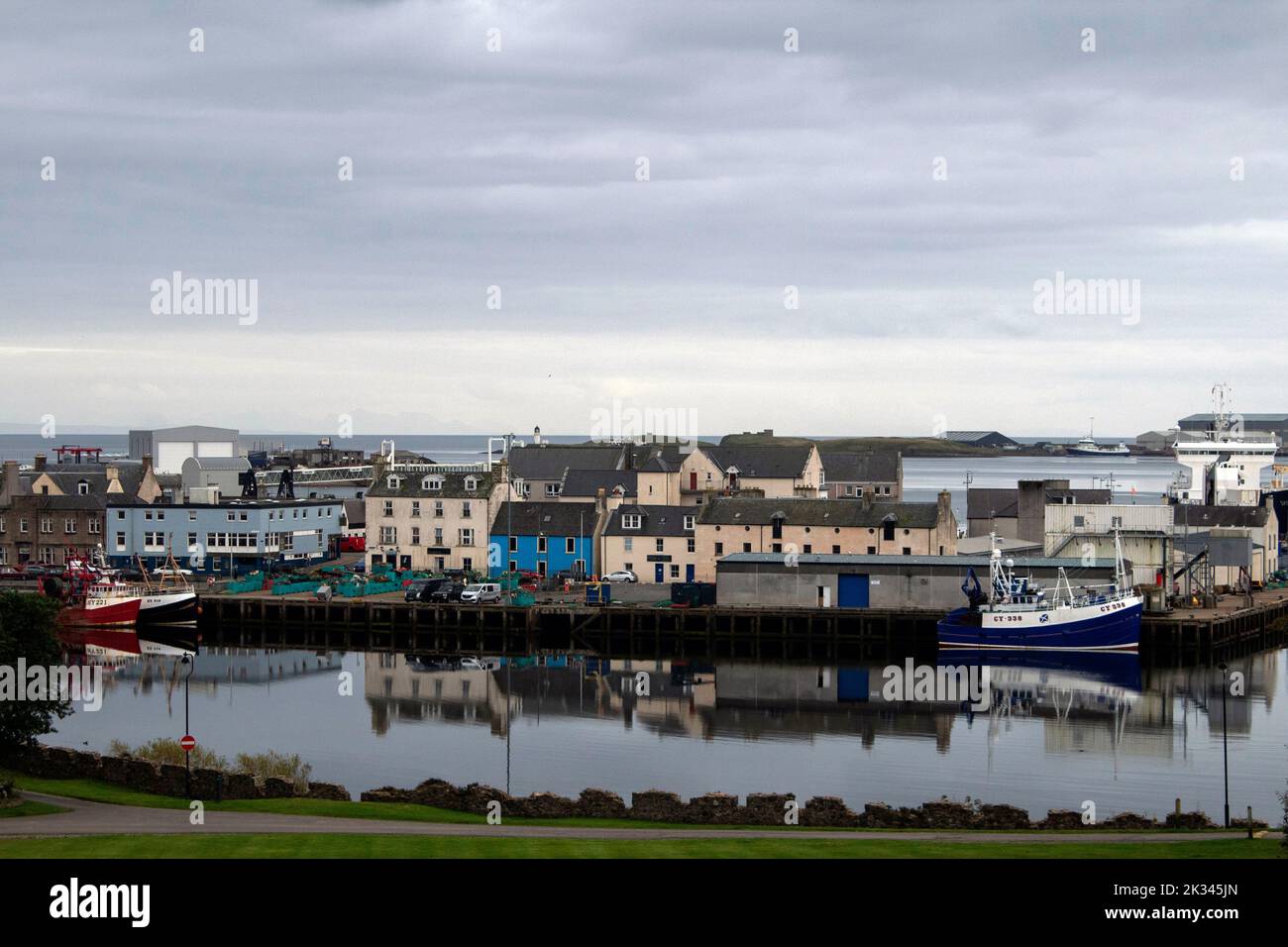 Rows of houses and shops lining the seafront at Stornoway harbour, Lewis, Western Isles Stock Photo