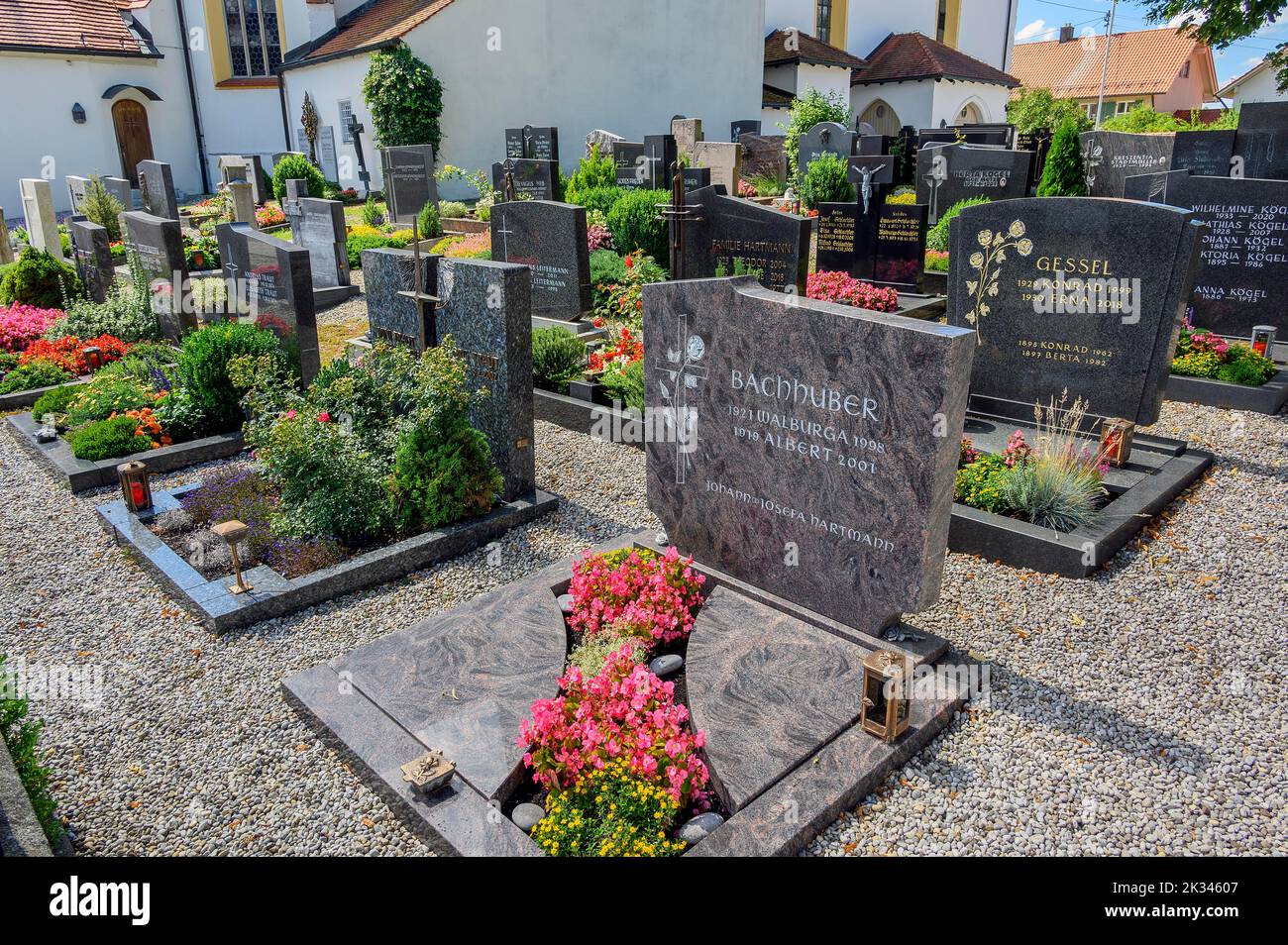 Cemetery at the church of St. Anna in Betzigau, Allgaeu, Bavaria, Germany Stock Photo