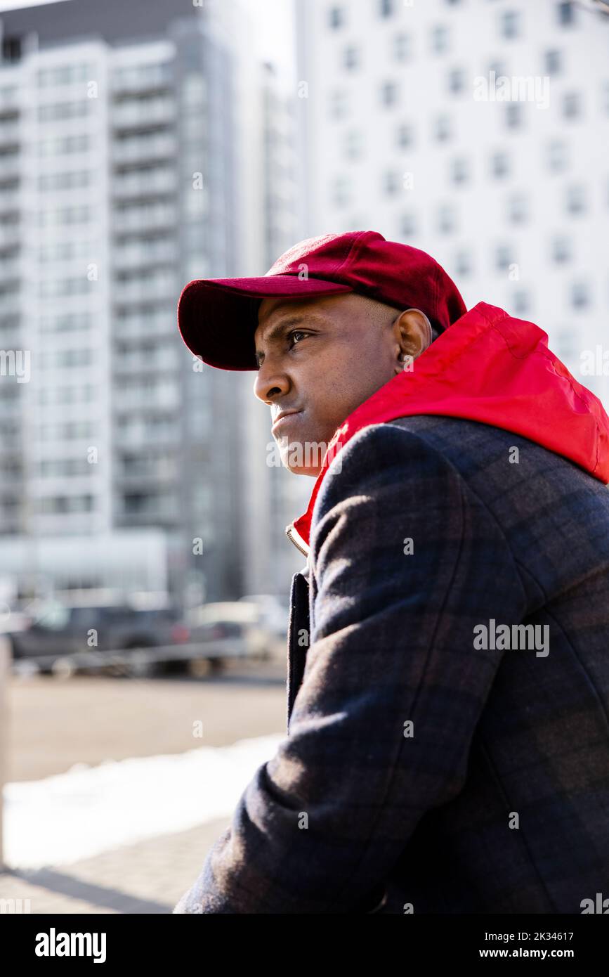 Man and baseball cap hi-res stock photography and images - Alamy