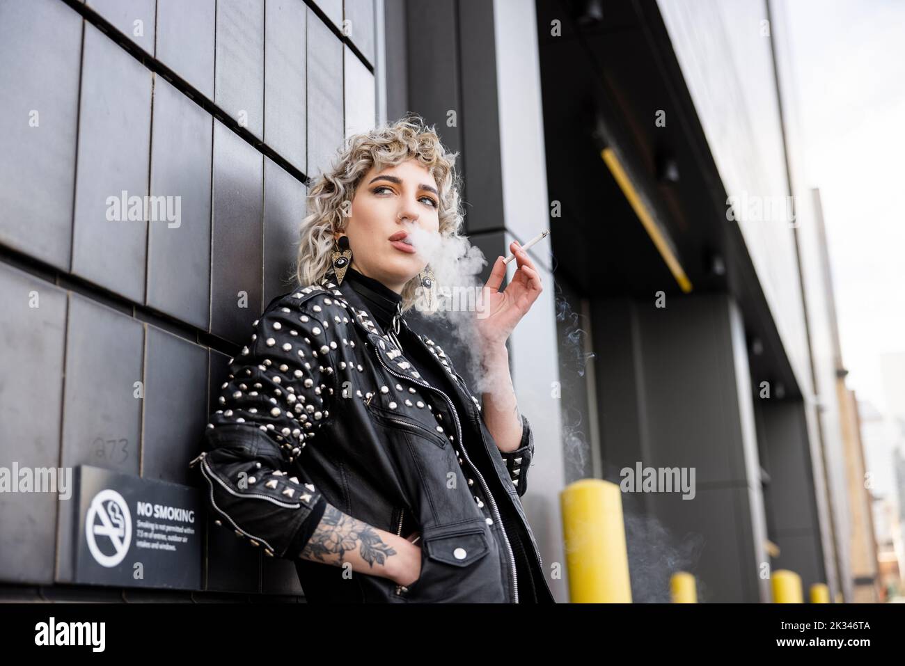 woman-in-leather-coat-hi-res-stock-photography-and-images-alamy