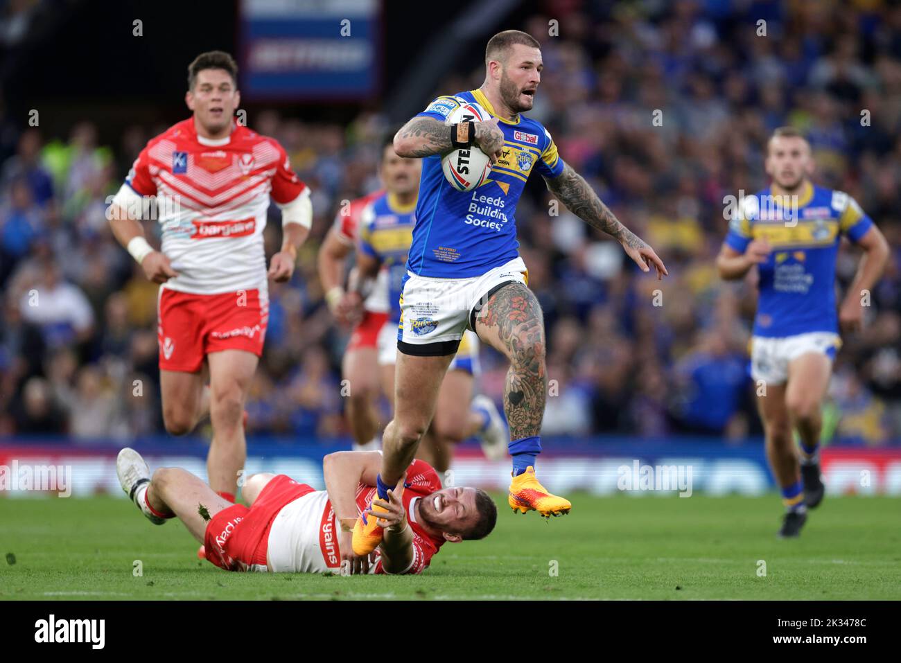 Leeds Rhinos' Zak Hardaker gets tackled during the Betfred Super League Grand Final at Old Trafford, Manchester. Picture date: Saturday September 24, 2022. Stock Photo