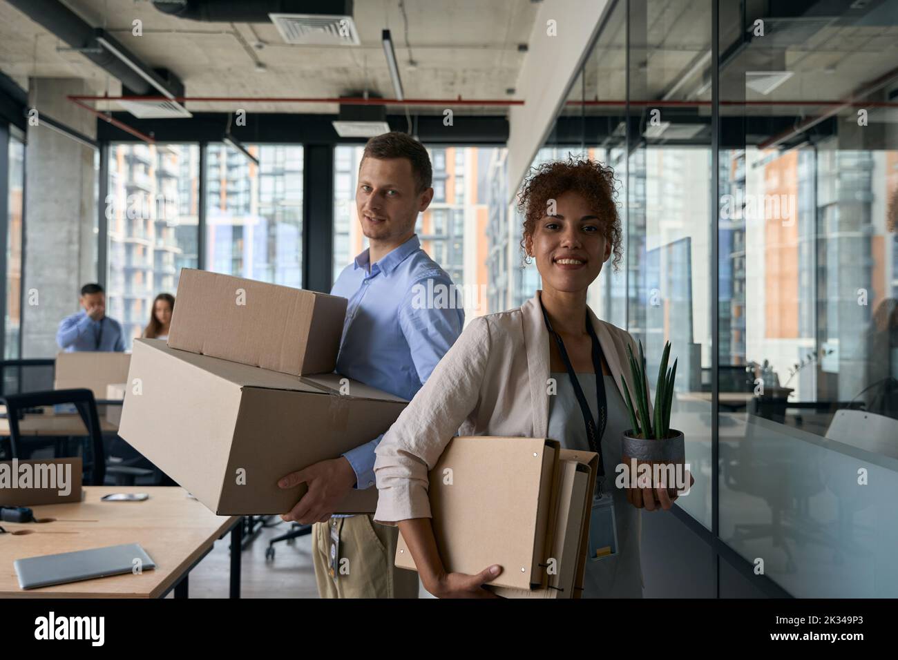 Group of corporate workers involved in office relocation Stock Photo
