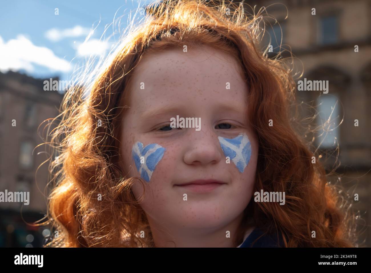 Glasgow, Scotland, UK. 24th September, 2022. Young Scotland football fan in George Square before the Nations League match with Ireland at Hampden Park. Credit: Skully/Alamy Live News Stock Photo