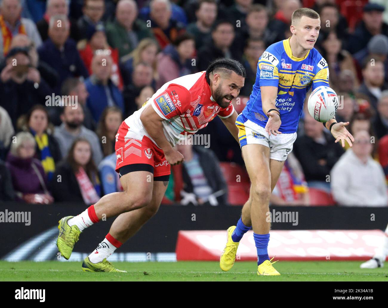 Leeds Rhinos' Ash Handley (right) clears the ball during the Betfred Super League Grand Final at Old Trafford, Manchester. Picture date: Saturday September 24, 2022. Stock Photo