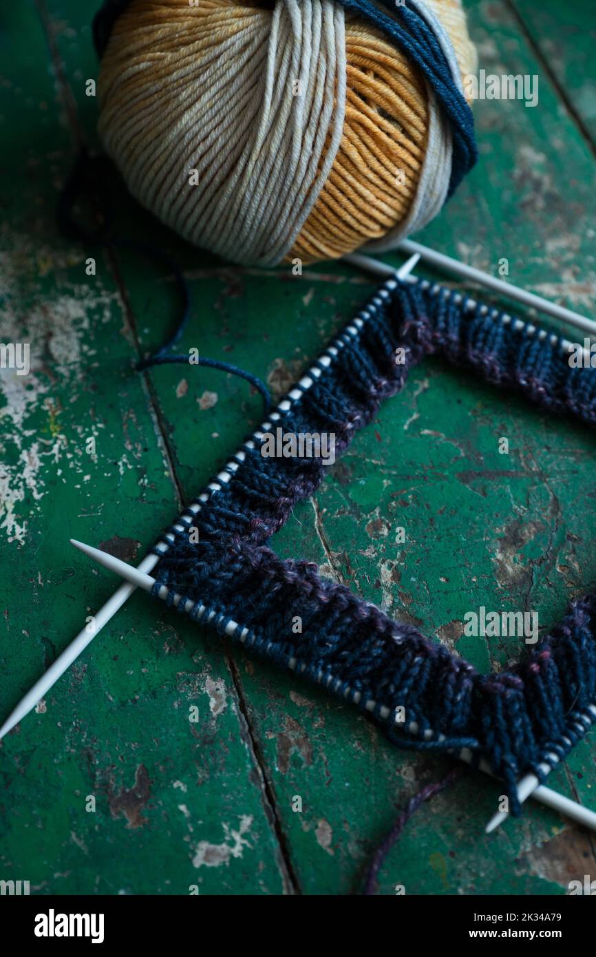 Handwork, started knitting with needle play Stock Photo Alamy