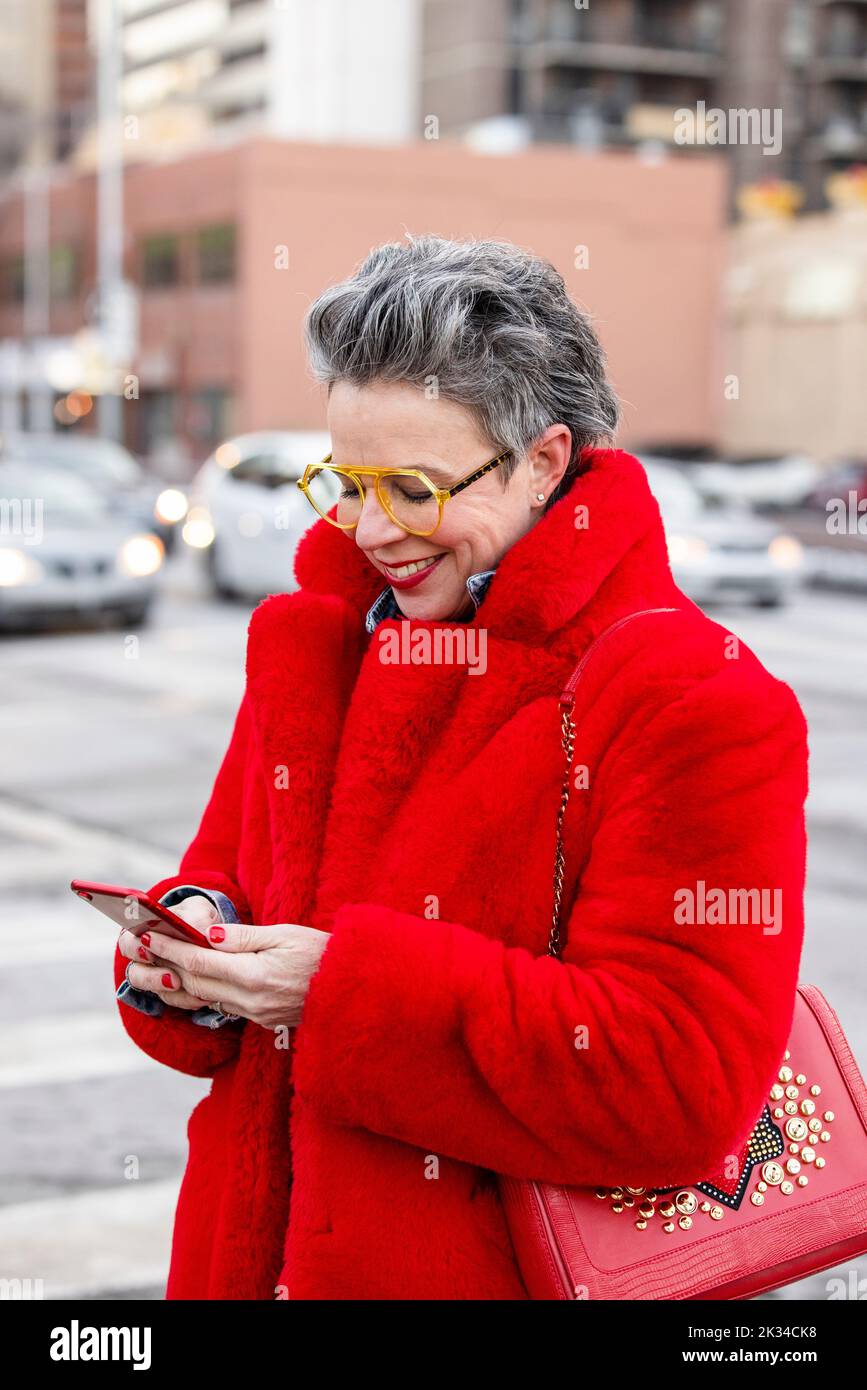 Mature woman standing street hi-res stock photography and images - Alamy