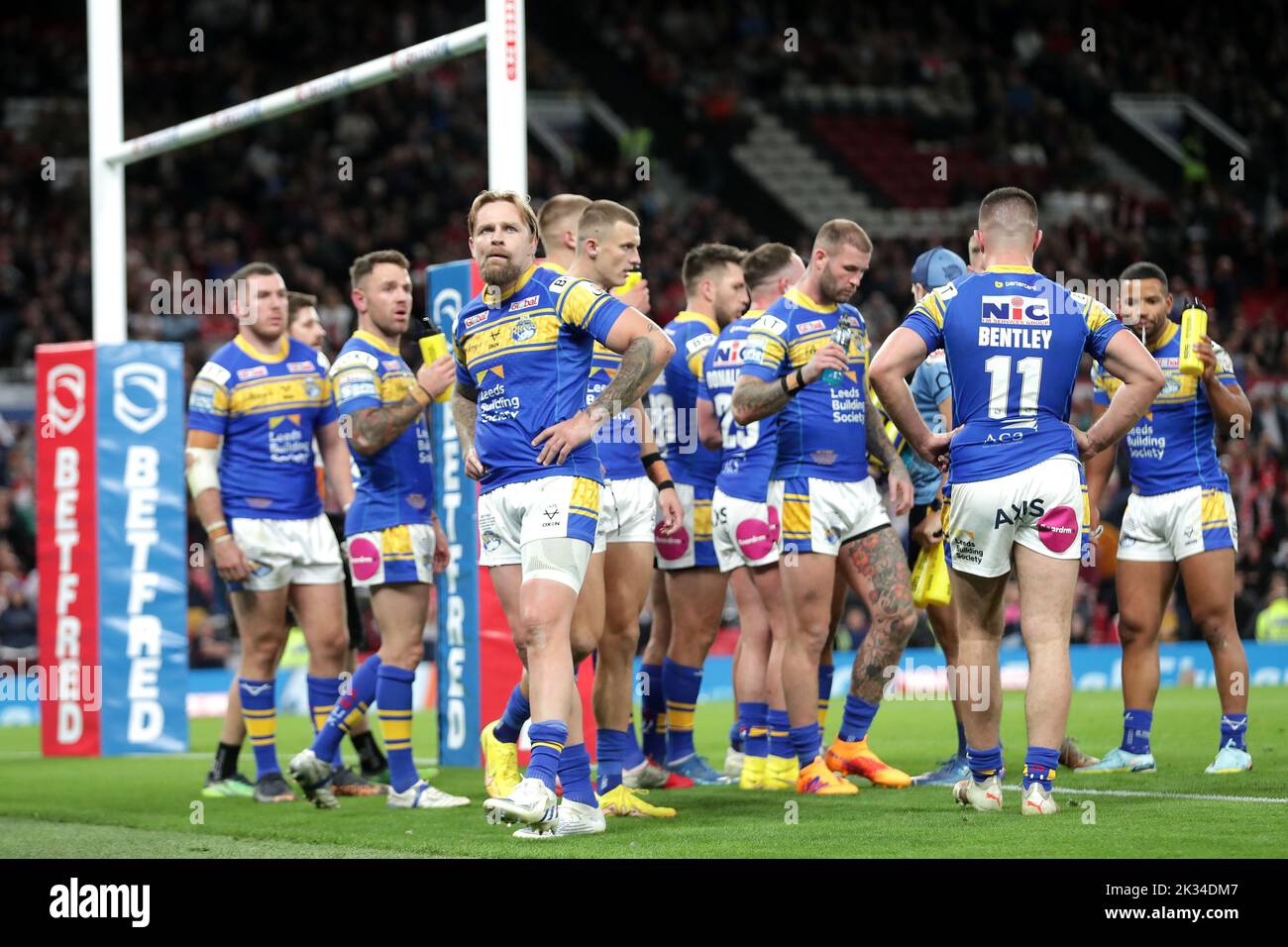 Leeds Rhions players look as St Helens' Mark Percival fourth try of the game is taken to the video referee before being given during the Betfred Super League Grand Final at Old Trafford, Manchester. Picture date: Saturday September 24, 2022. Stock Photo