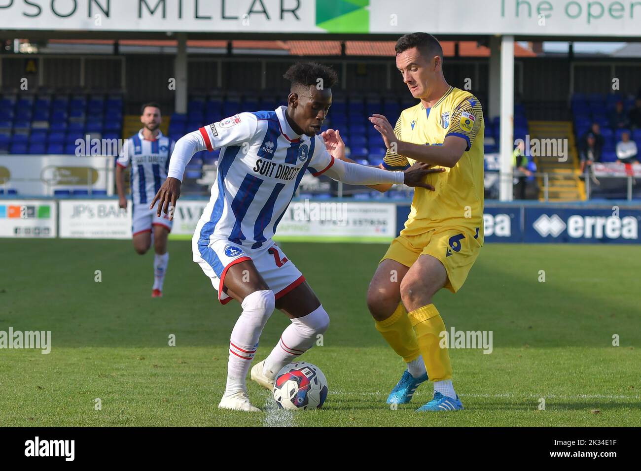 Hartlepool, UK. 17th Oct, 2021. Hartlepool United's Clarke Oduor looks to take on Gillingham FC Shaun Williams during the Sky Bet League 2 match between Hartlepool United and Gillingham at Victoria Park, Hartlepool on Saturday 24th September 2022. (Credit: Scott Llewellyn | MI News) Credit: MI News & Sport /Alamy Live News Stock Photo