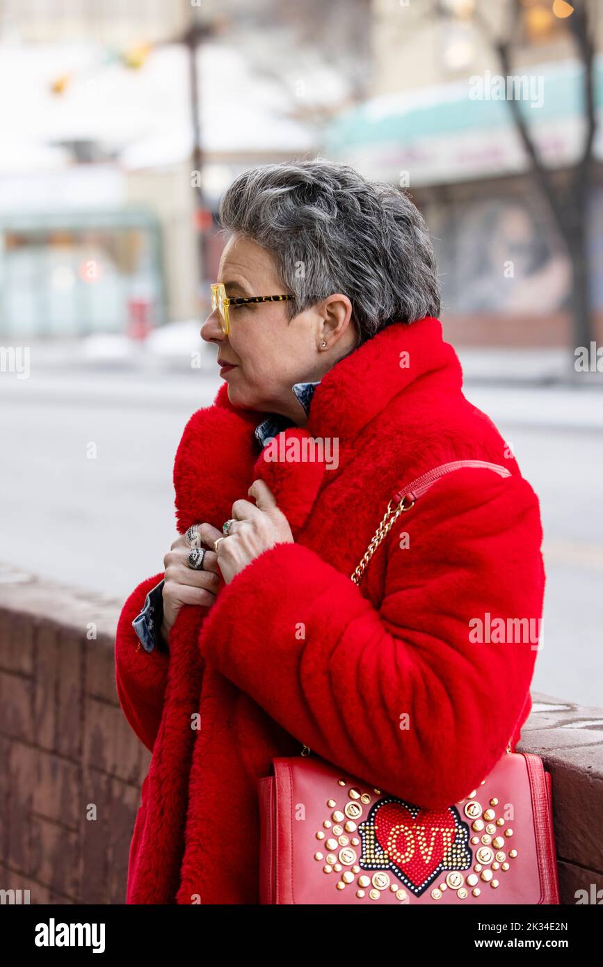 Mature woman standing street hi-res stock photography and images - Alamy