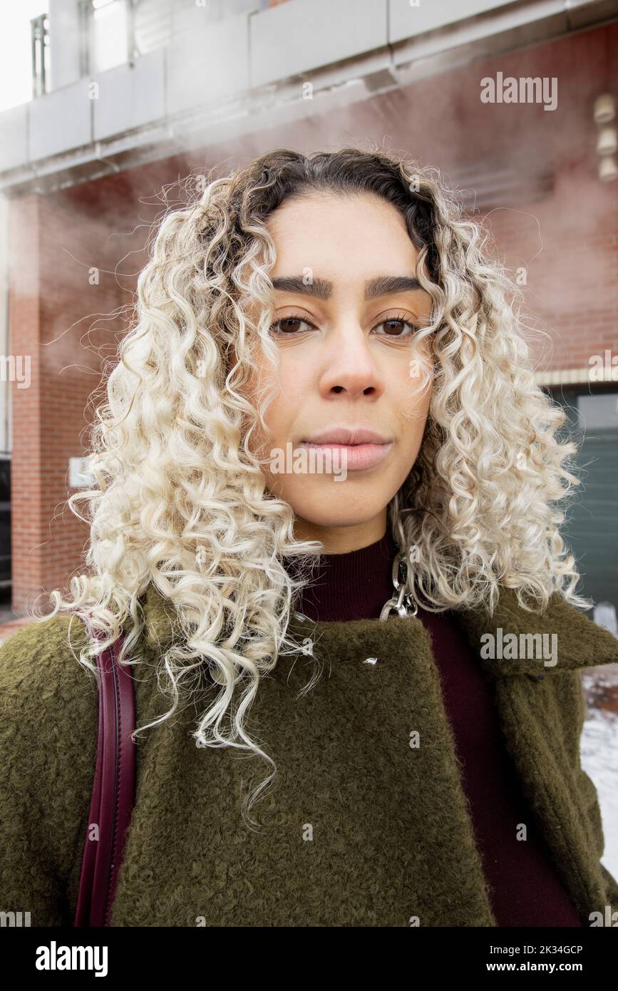 Curly hair woman blonde hi-res stock photography and images - Alamy