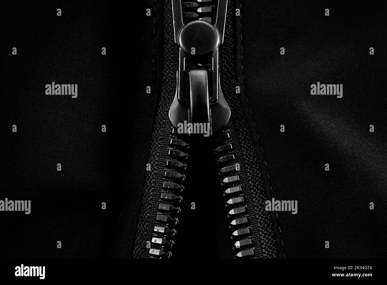 Black lock with a zipper on clothes closeup. Lock Stock Photo Alamy