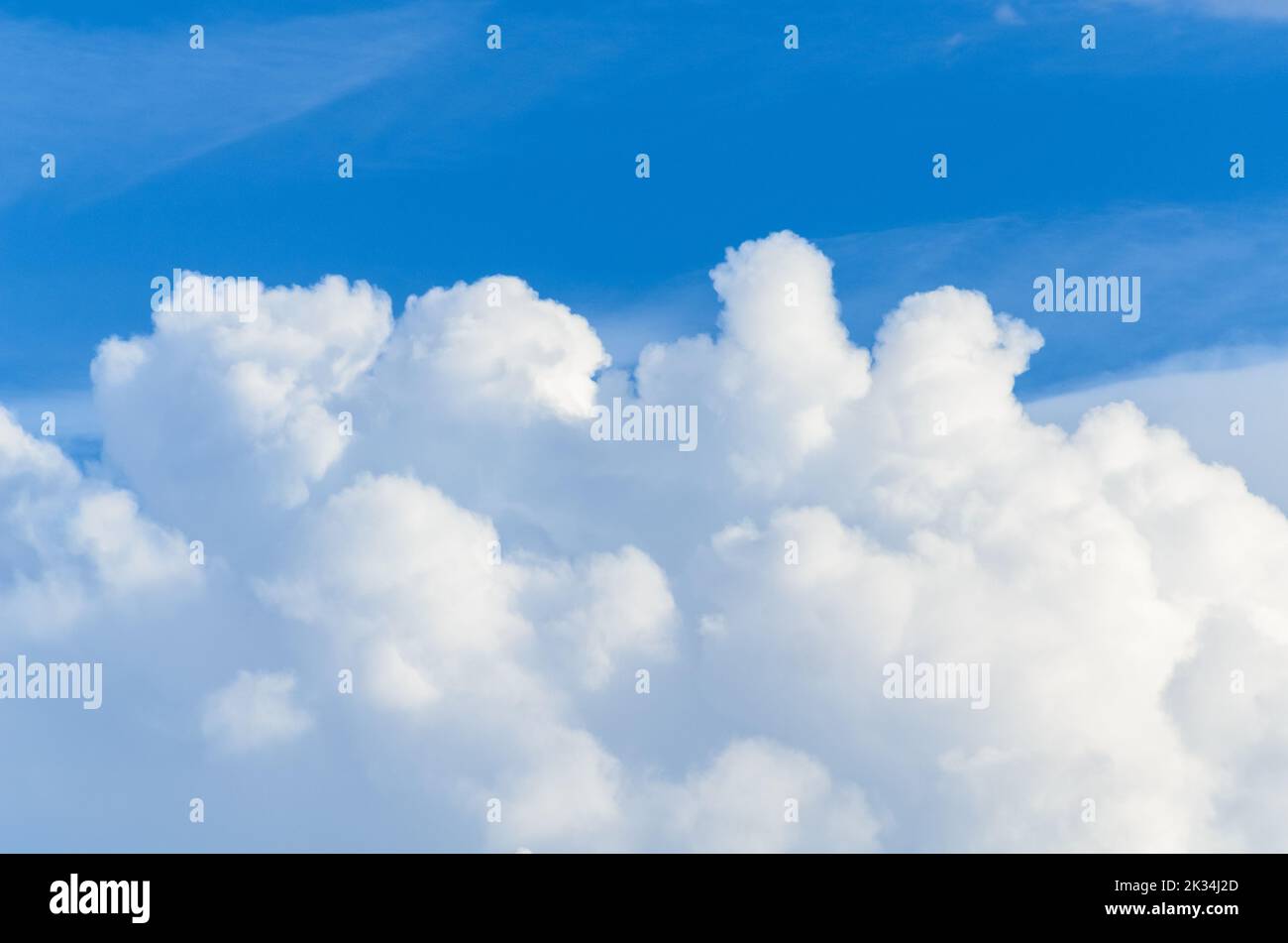 White fluffy cumulus clouds and blue sky Stock Photo - Alamy