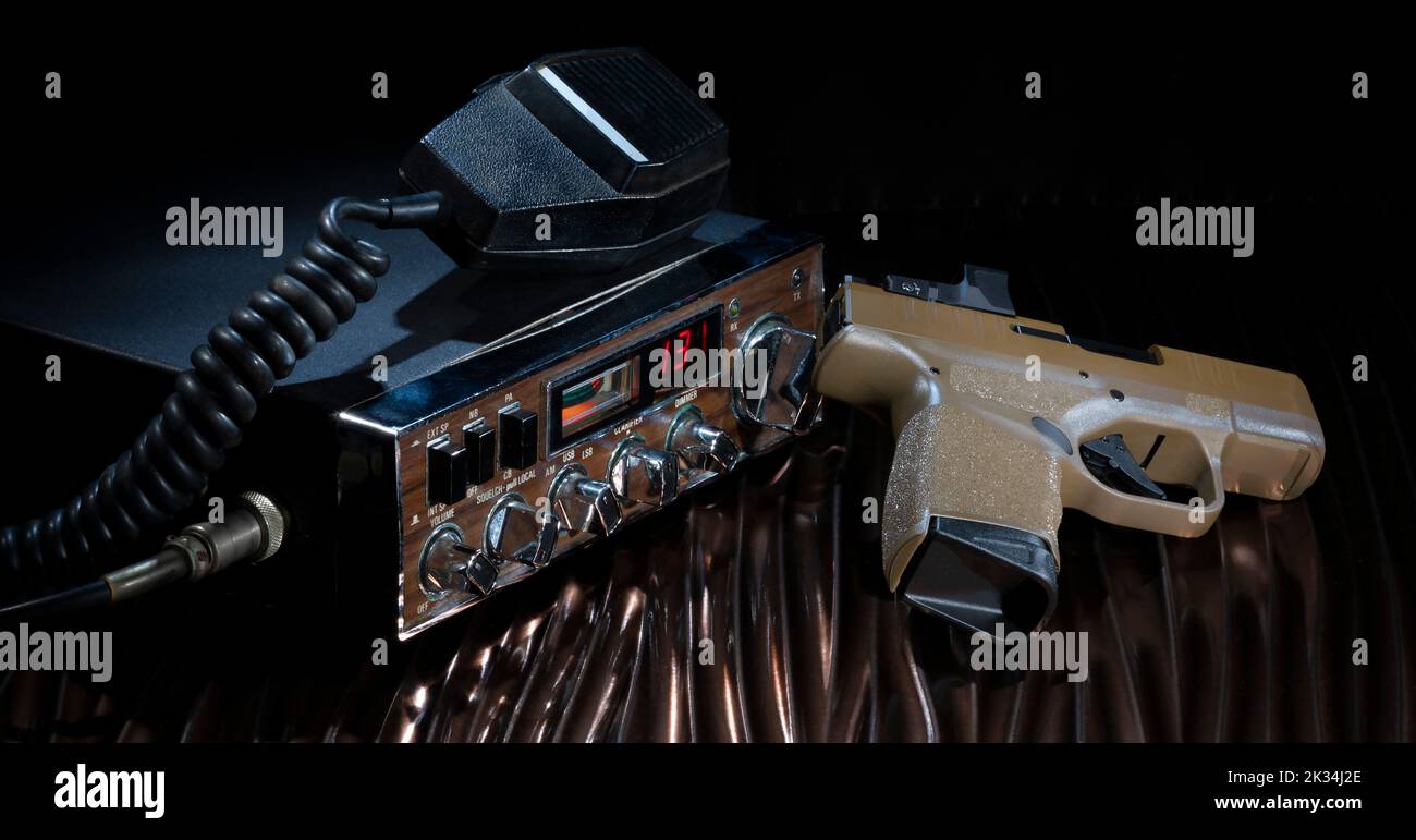 Channel 13 on a sideband CB radio with semiauto pistol on the side