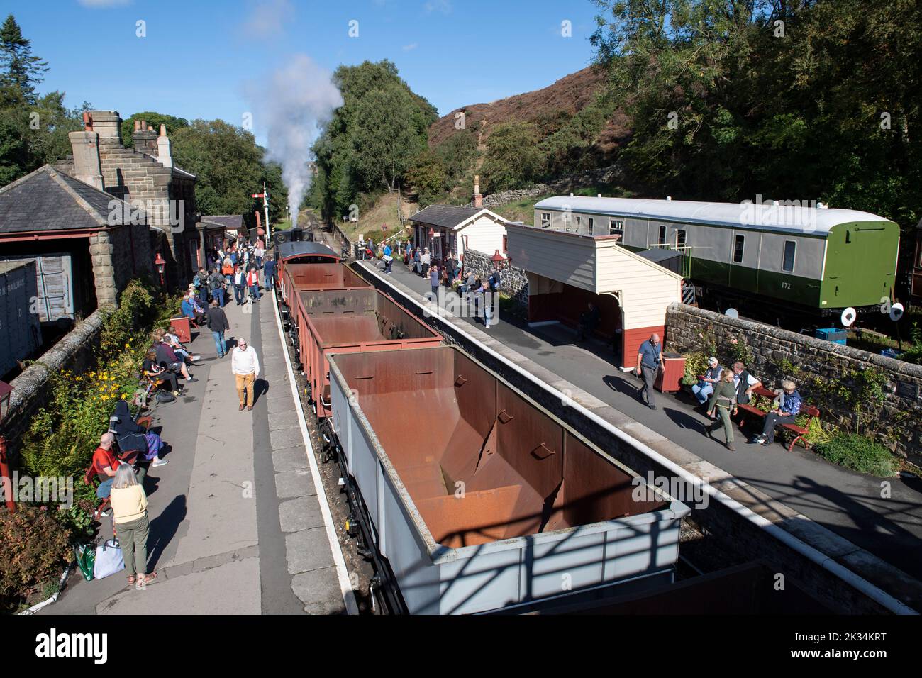 A freight train in Goathland station on the North Yorkshire Moors Railway Stock Photo