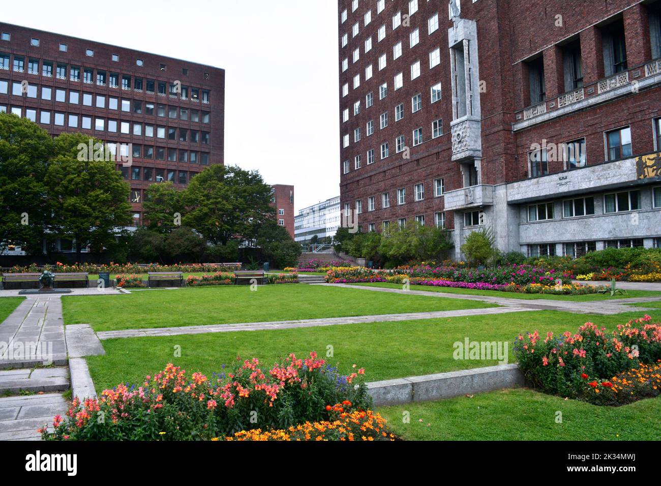 Oslo, Norway, September 2022: Crown Princess Märtha's Square park with the west wall of Oslo City Hall at the back. Stock Photo