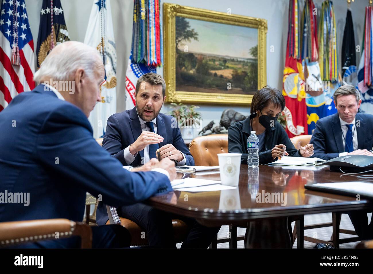 Washington, United States. 23rd Sep, 2022. U.S. President Joe Biden, left, listens to National Economic Council Brian Deese, 2nd left, during a meeting with his economic team in the White House, September 23, 2022, in Washington, DC Credit: Adam Schultz/White House Photo/Alamy Live News Stock Photo