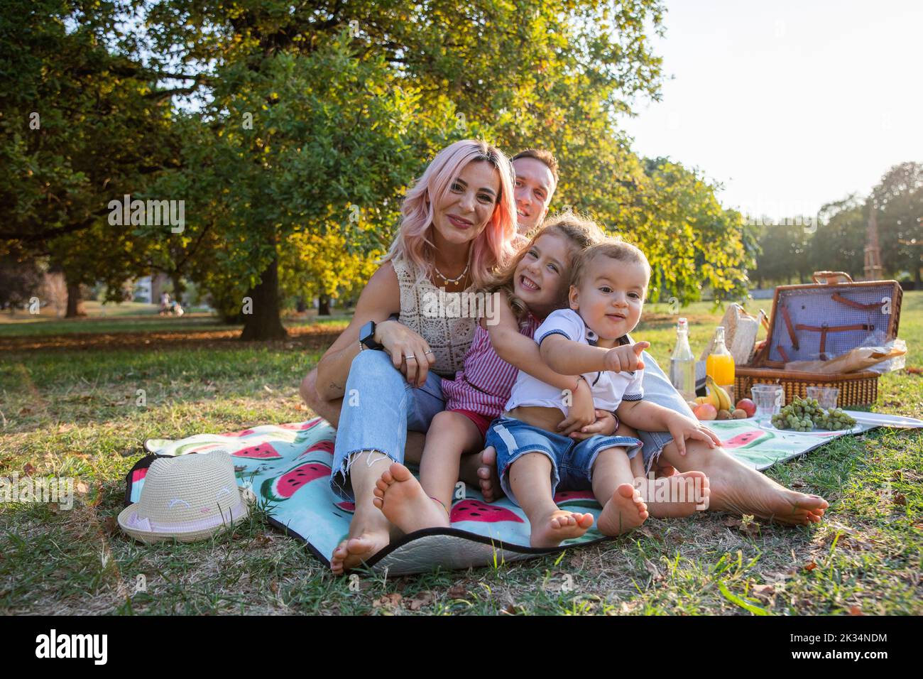 Cute happy family on picnic hi-res stock photography and images - Alamy