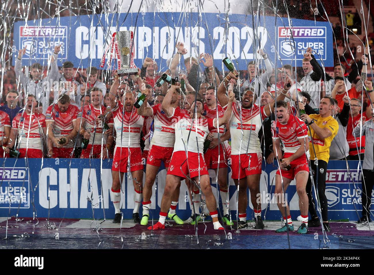 St Helens players and staff celebrate with the trophy after victory in the Betfred Super League Grand Final at Old Trafford, Manchester. Picture date: Saturday September 24, 2022. Stock Photo
