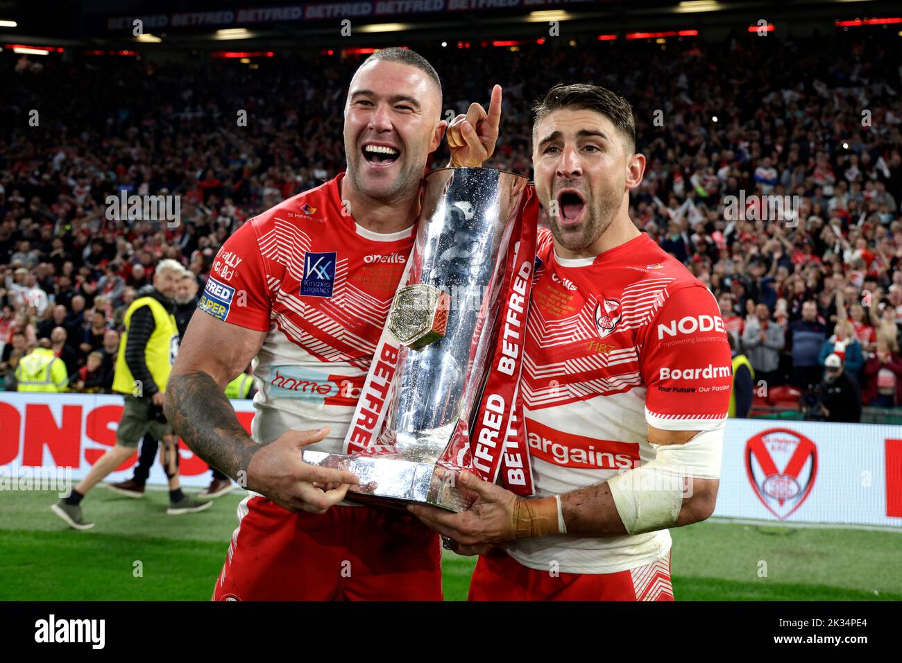 St Helens' Curtis Sironen (left) and Tommy Makinson celebrate with the trophy after victory in the Betfred Super League Grand Final at Old Trafford, Manchester. Picture date: Saturday September 24, 2022. Stock Photo