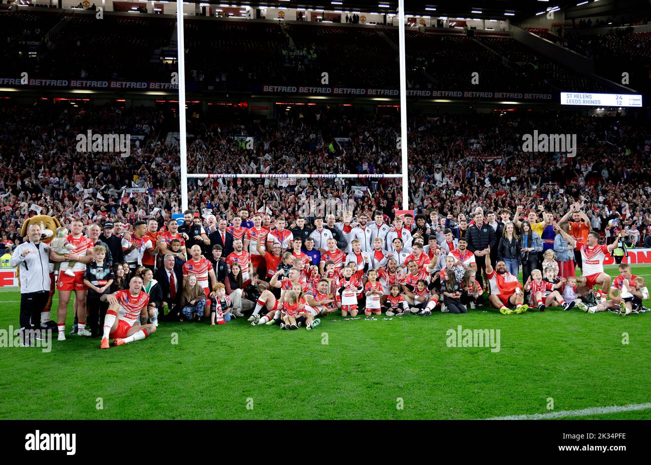 St Helens players and staff celebrate with the trophy after victory in the Betfred Super League Grand Final at Old Trafford, Manchester. Picture date: Saturday September 24, 2022. Stock Photo