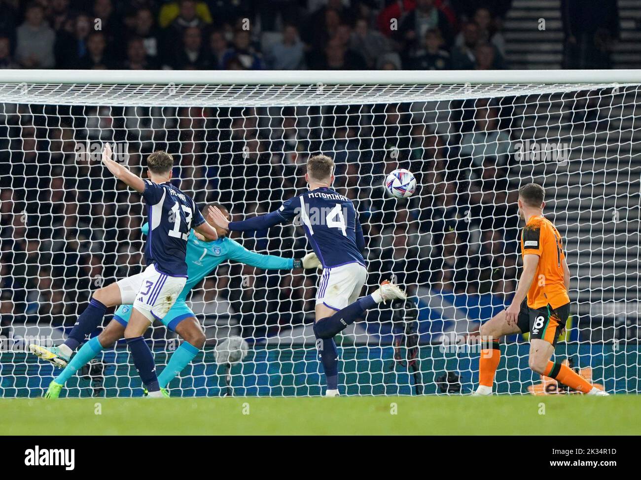 Scotland's Jack Hendry (left) scores his sides first goal of the game during the UEFA Nations League Group E Match at Hampden Park, Glasgow. Picture date: Saturday September 24, 2022. Stock Photo