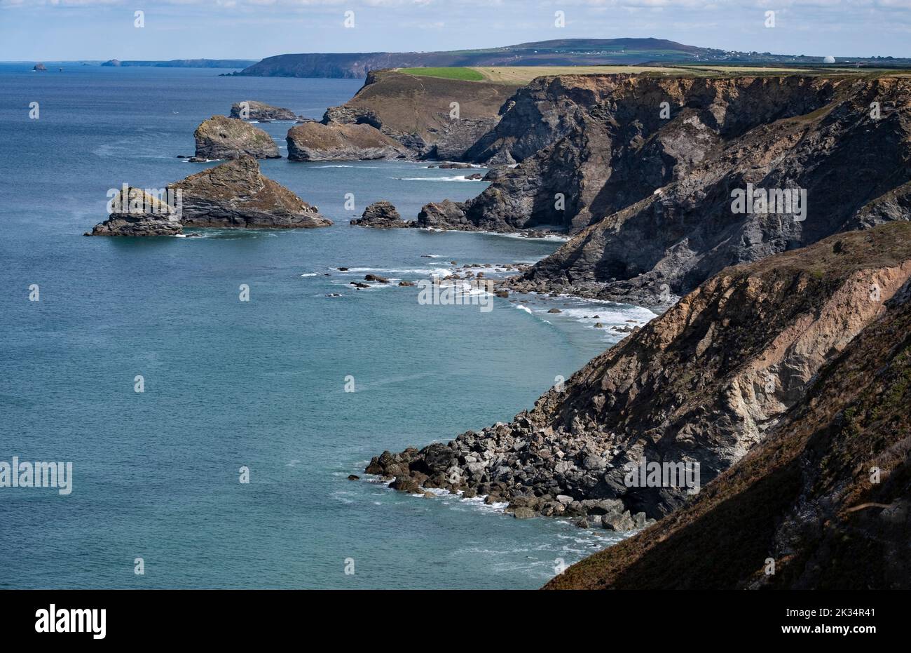 A view of the rugged north Cornwall coastline near Portreath showing the Crane and Samphire Islands, England. Stock Photo