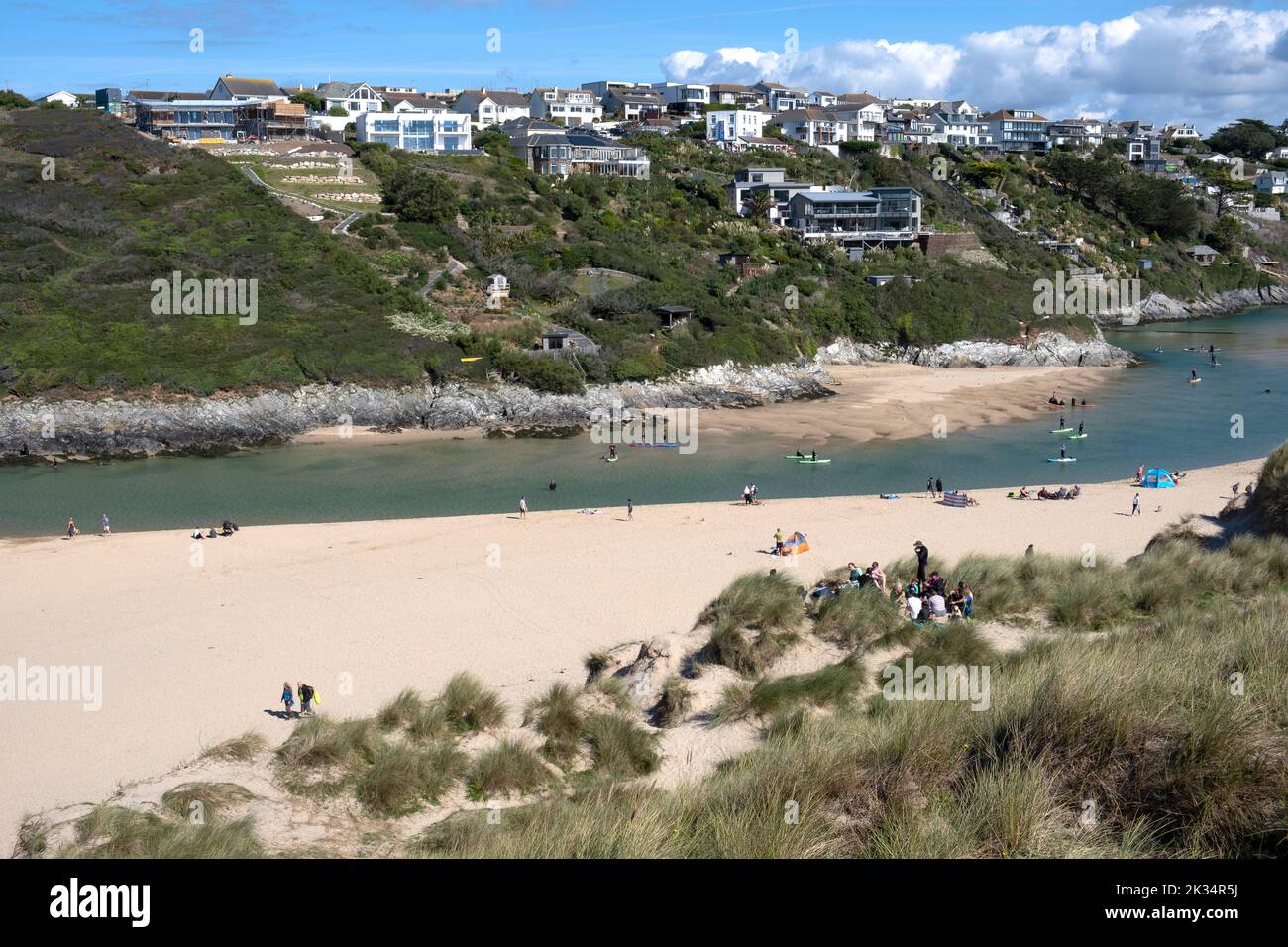An aerial view of the village of Pentire high on a headland overlooking Crantock beach in North Cornwall, England. Stock Photo
