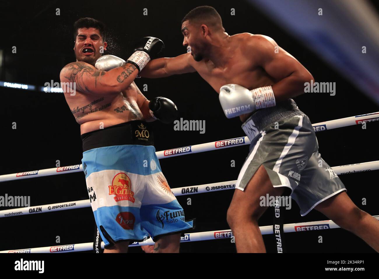 Solomon Dacres (right) in action against Ariel Esteban Bracamonte in the Heavyweight contest at Motorpoint Arena, Nottingham. Picture date: Saturday September 24, 2022. Stock Photo