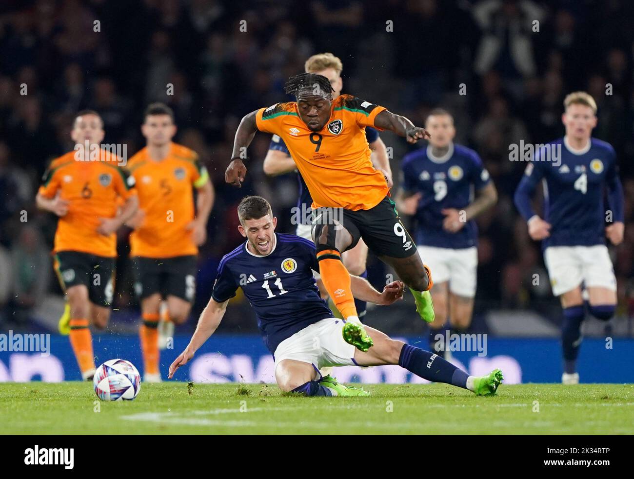 Scotland's Ryan Christie (left) and Republic of Ireland's Michael Obafemi battle for the ball during the UEFA Nations League Group E Match at Hampden Park, Glasgow. Picture date: Saturday September 24, 2022. Stock Photo