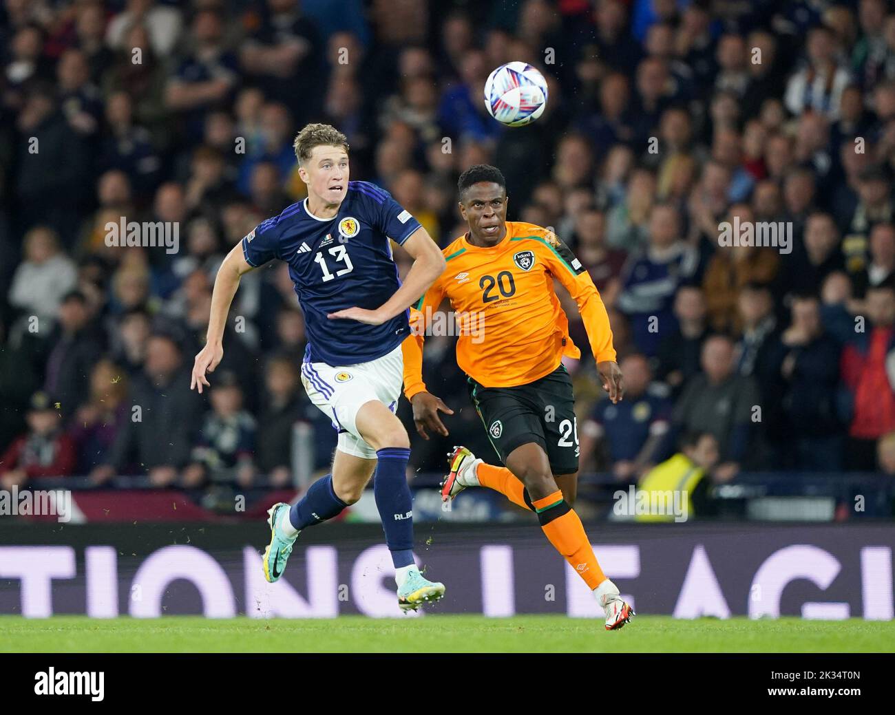 Scotland's Jack Hendry (left) and Republic of Ireland's Chiedozie Ogbene battle for the ball during the UEFA Nations League Group E Match at Hampden Park, Glasgow. Picture date: Saturday September 24, 2022. Stock Photo