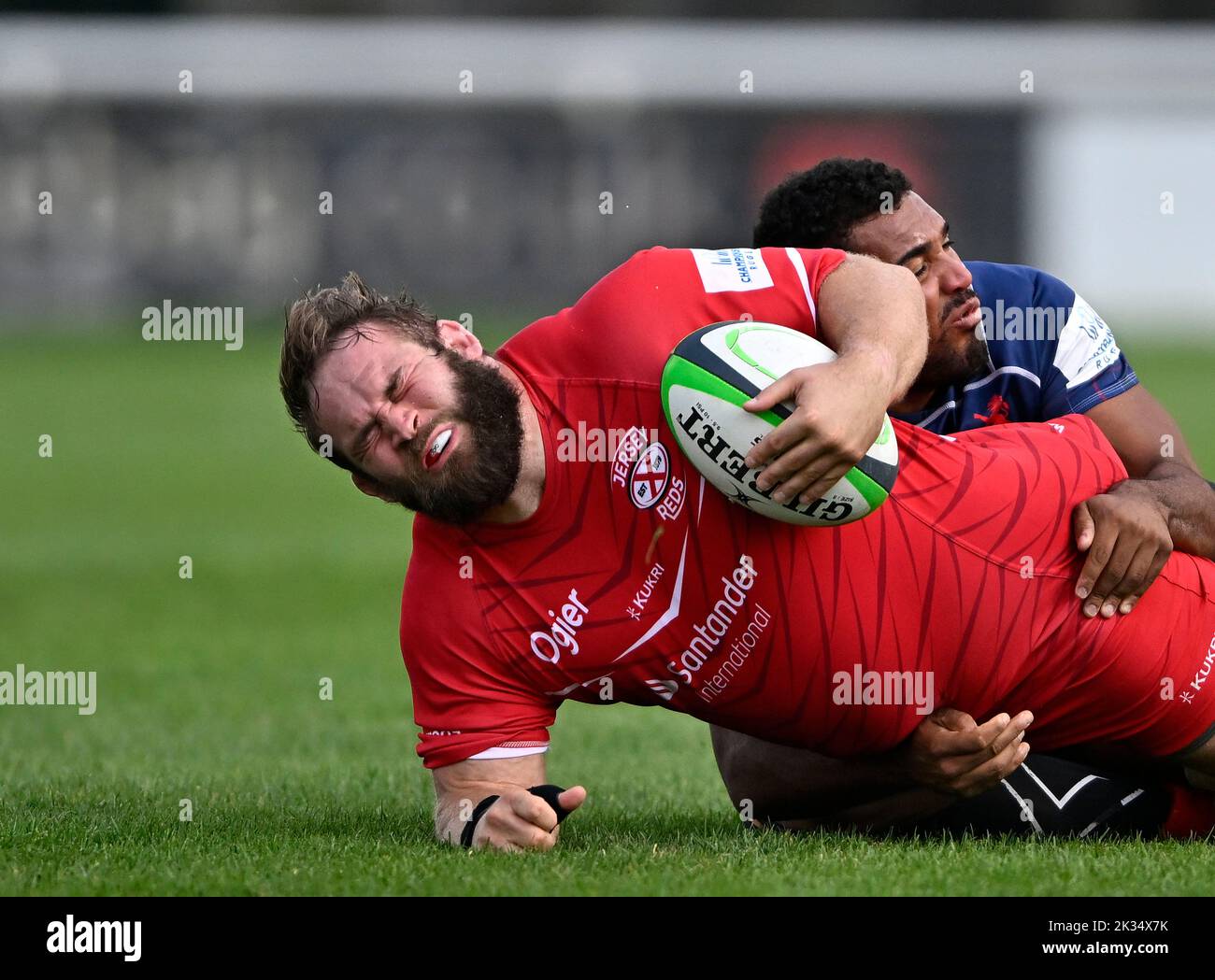 Richmond, United Kingdom. 24th Sep, 2022. Championship Rugby. London Scottish V Jersey Reds. The Richmond Athletic Ground. Richmond. Steve Longwell (Jersey Reds) is tackled by Cameron King (London Scottish) during the London Scottish V Jersey Reds championship rugby match. Credit: Sport In Pictures/Alamy Live News Stock Photo
