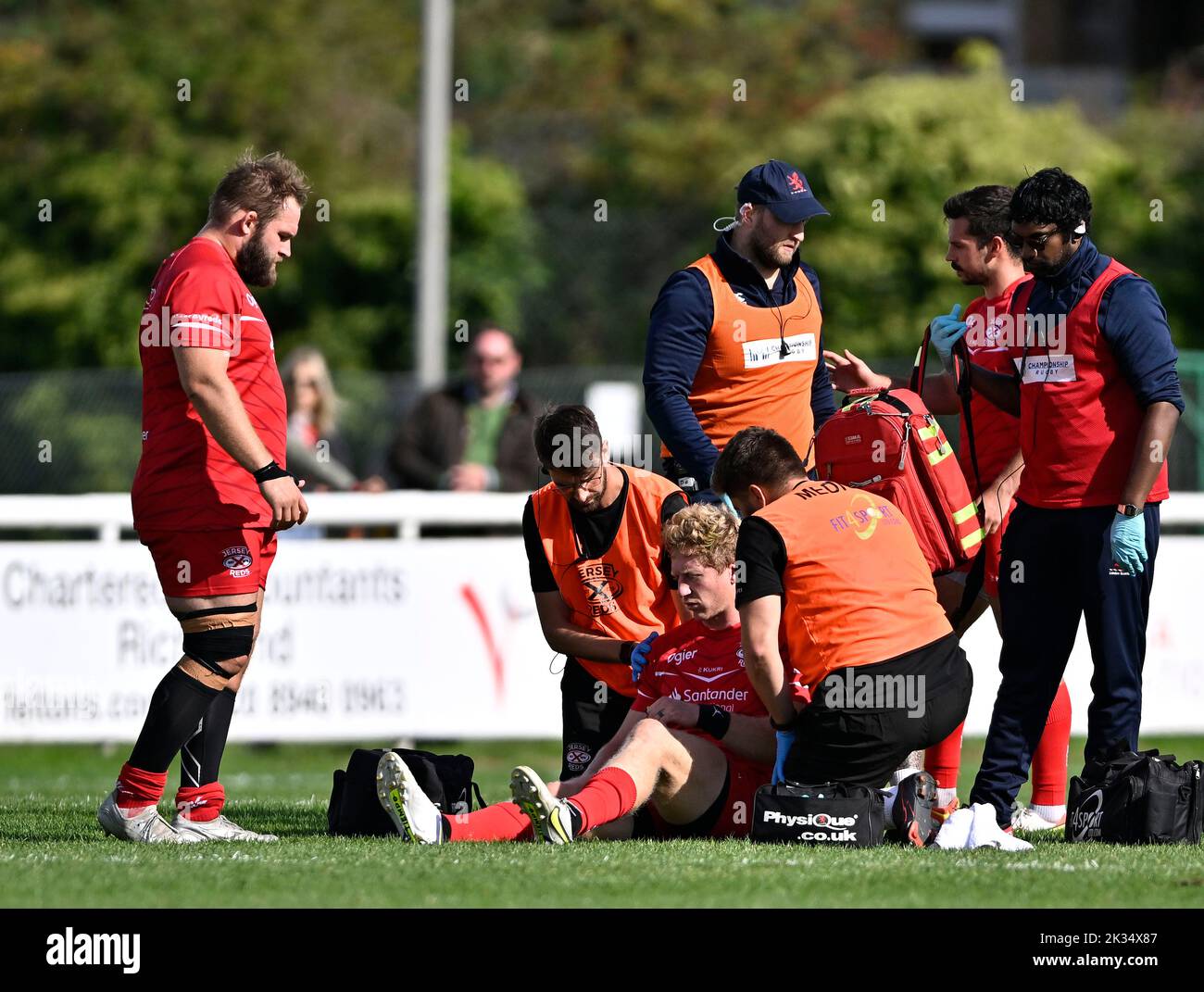 Richmond, United Kingdom. 24th Sep, 2022. Championship Rugby. London Scottish V Jersey Reds. The Richmond Athletic Ground. Richmond. Scott van Breda (Jersey Reds) sits up following treatment after a crunching tackle during the London Scottish V Jersey Reds championship rugby match. Credit: Sport In Pictures/Alamy Live News Stock Photo