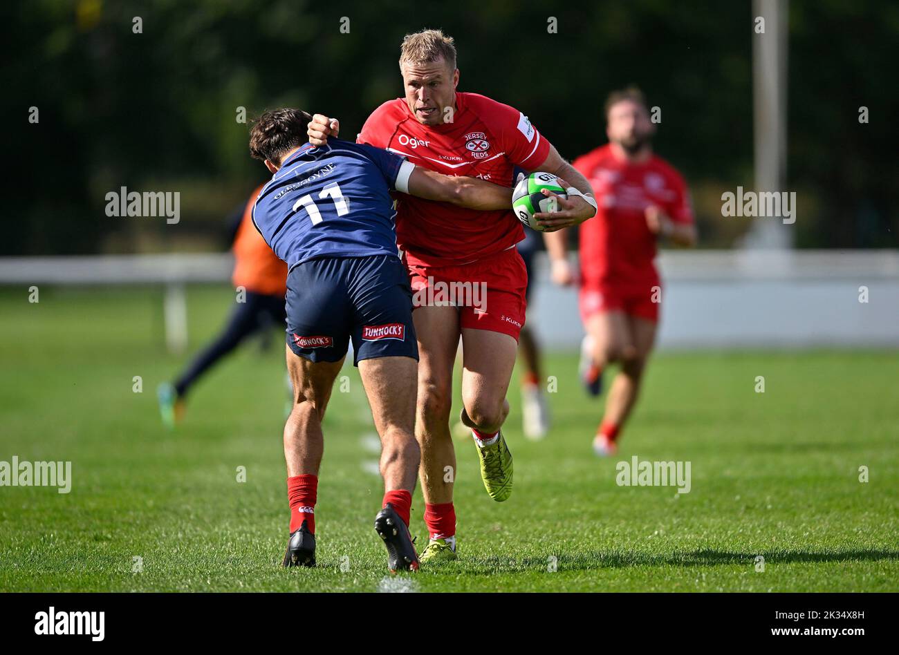 Richmond, United Kingdom. 24th Sep, 2022. Championship Rugby. London Scottish V Jersey Reds. The Richmond Athletic Ground. Richmond. Ben Woollett (Jersey Reds) tries to get past Josh Gillespie (London Scottish) during the London Scottish V Jersey Reds championship rugby match. Credit: Sport In Pictures/Alamy Live News Stock Photo
