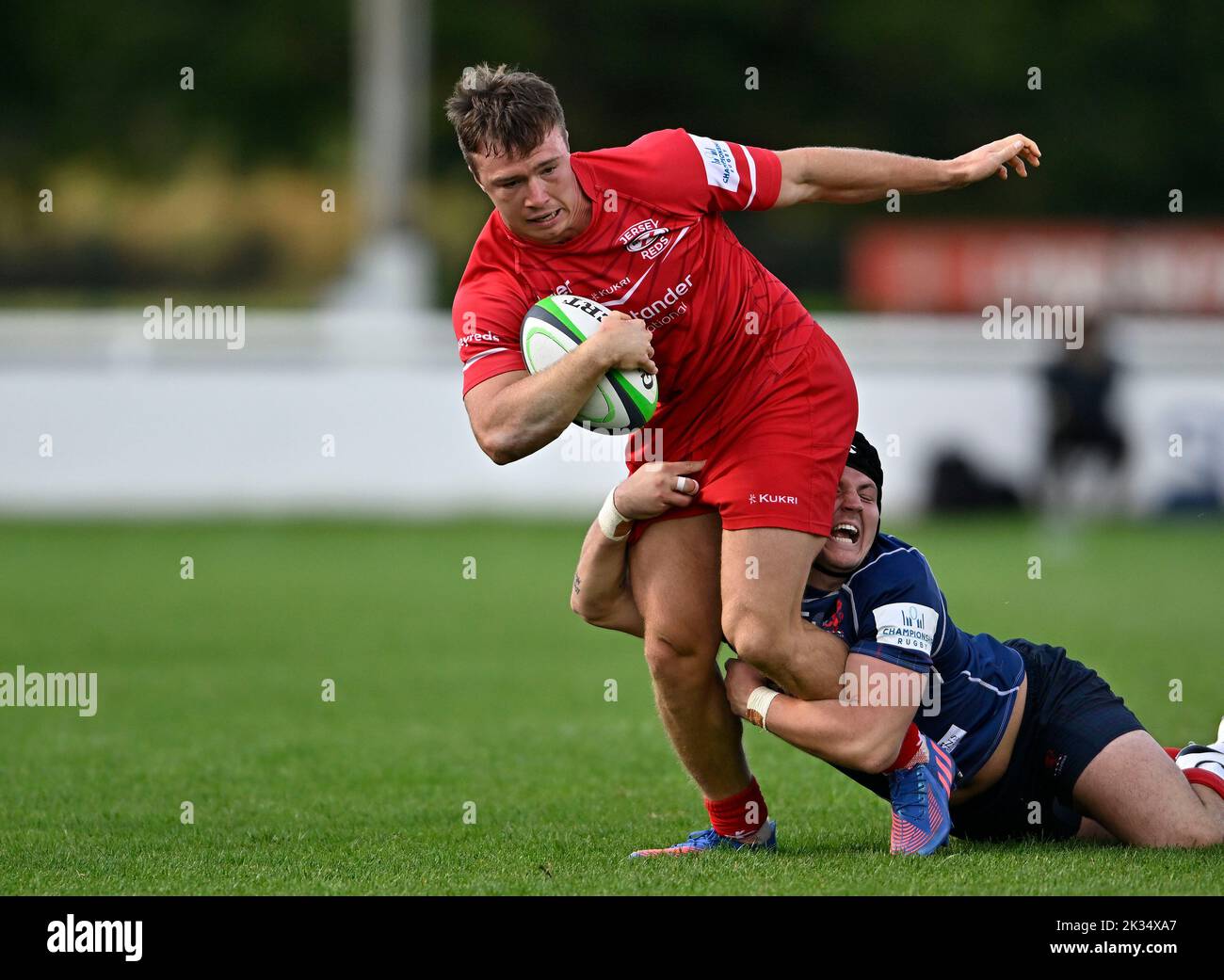 Richmond, United Kingdom. 24th Sep, 2022. Championship Rugby. London Scottish V Jersey Reds. The Richmond Athletic Ground. Richmond. Charlie Powell (Jersey Reds) is tackled by Harry Sheppard (London Scottish) during the London Scottish V Jersey Reds championship rugby match. Credit: Sport In Pictures/Alamy Live News Stock Photo