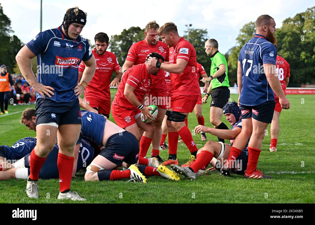Richmond, United Kingdom. 24th Sep, 2022. Championship Rugby. London Scottish V Jersey Reds. The Richmond Athletic Ground. Richmond. The Jersey players congratulate try scorer James Hadfield (Jersey Reds, with ball) after he scores a try during the London Scottish V Jersey Reds championship rugby match. Credit: Sport In Pictures/Alamy Live News Stock Photo