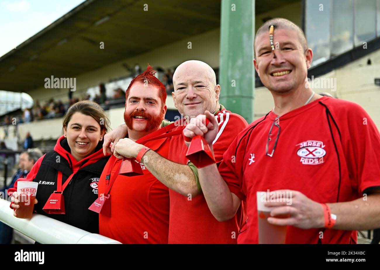 Richmond, United Kingdom. 24th Sep, 2022. Championship Rugby. London Scottish V Jersey Reds. The Richmond Athletic Ground. Richmond. Jersey fans with their beer and bells during the London Scottish V Jersey Reds championship rugby match. Credit: Sport In Pictures/Alamy Live News Stock Photo