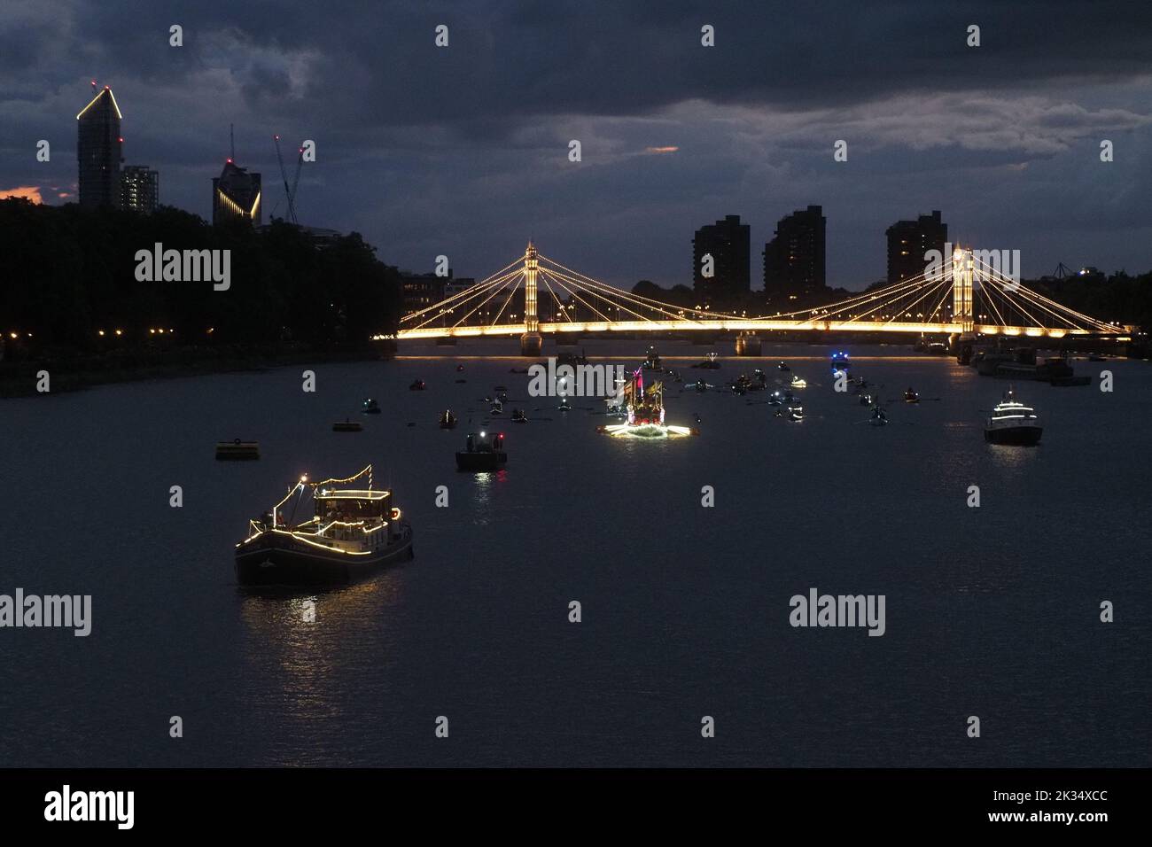 London, UK. 24th Sep, 2022. The Thames Flotilla in memory of Queen Elizabeth takes off down the Thames Credit: Brian Minkoff /Alamy Live News Stock Photo