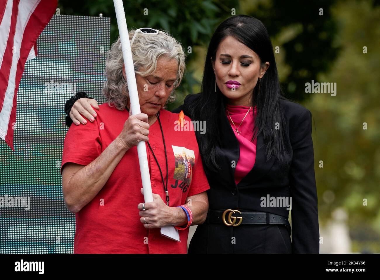 Micki Witthoeft, the mother of Ashli Babbitt who was shot and killed during the January 6th attack on the U.S. Capitol, and Cara Castronuova stand on stage during an event supporting the people charged with crimes related to the January 6th, 2021 attack on the U.S. Capitol, in Washington, U.S., September 24, 2022. REUTERS/Elizabeth Frantz Stock Photo