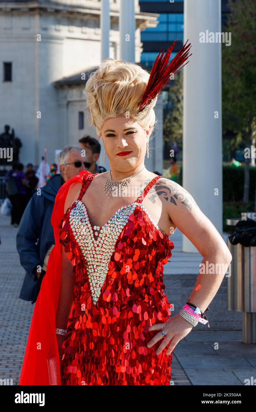 blonde trans woman in drag wearing red sparkly dress  at Gay Pride parade protest 2022 in Birmingham city centre uk september 24th 2022 Stock Photo