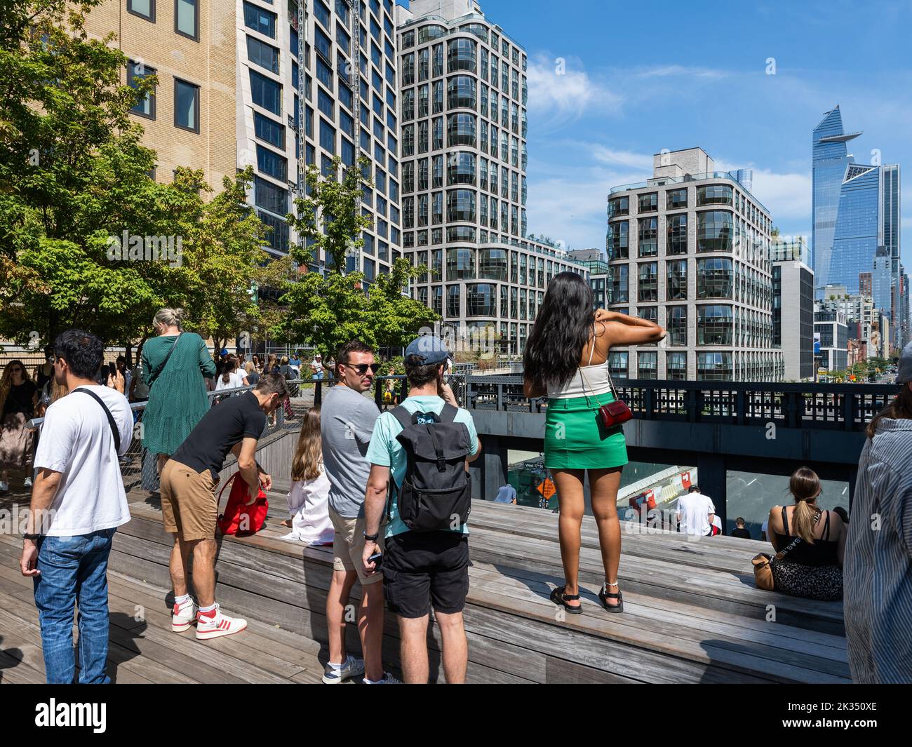 People on the High Line in Chelsea neighborhood of Manhattan Stock Photo