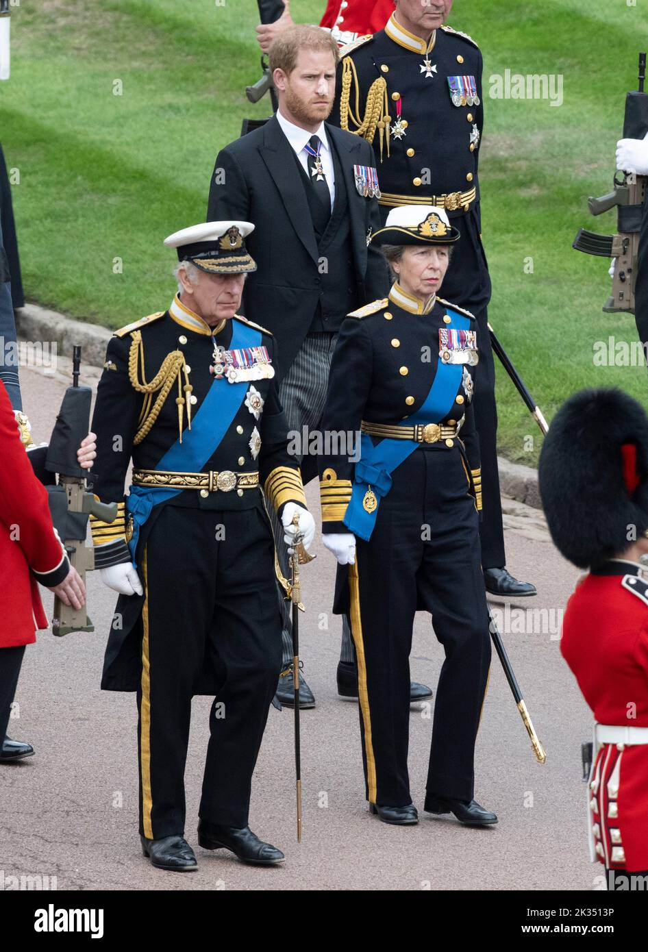 Windsor, England. UK. 19 September, 2022. King Charles lll, Princess Anne, Princess Royal and Prince Harry, Duke of Sussex  follow as the coffin of Qu Stock Photo