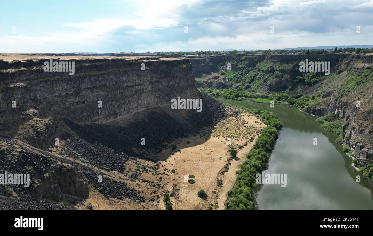 Natural Formations Rivers A beautiful view of a river surrounded by geological formations with ...