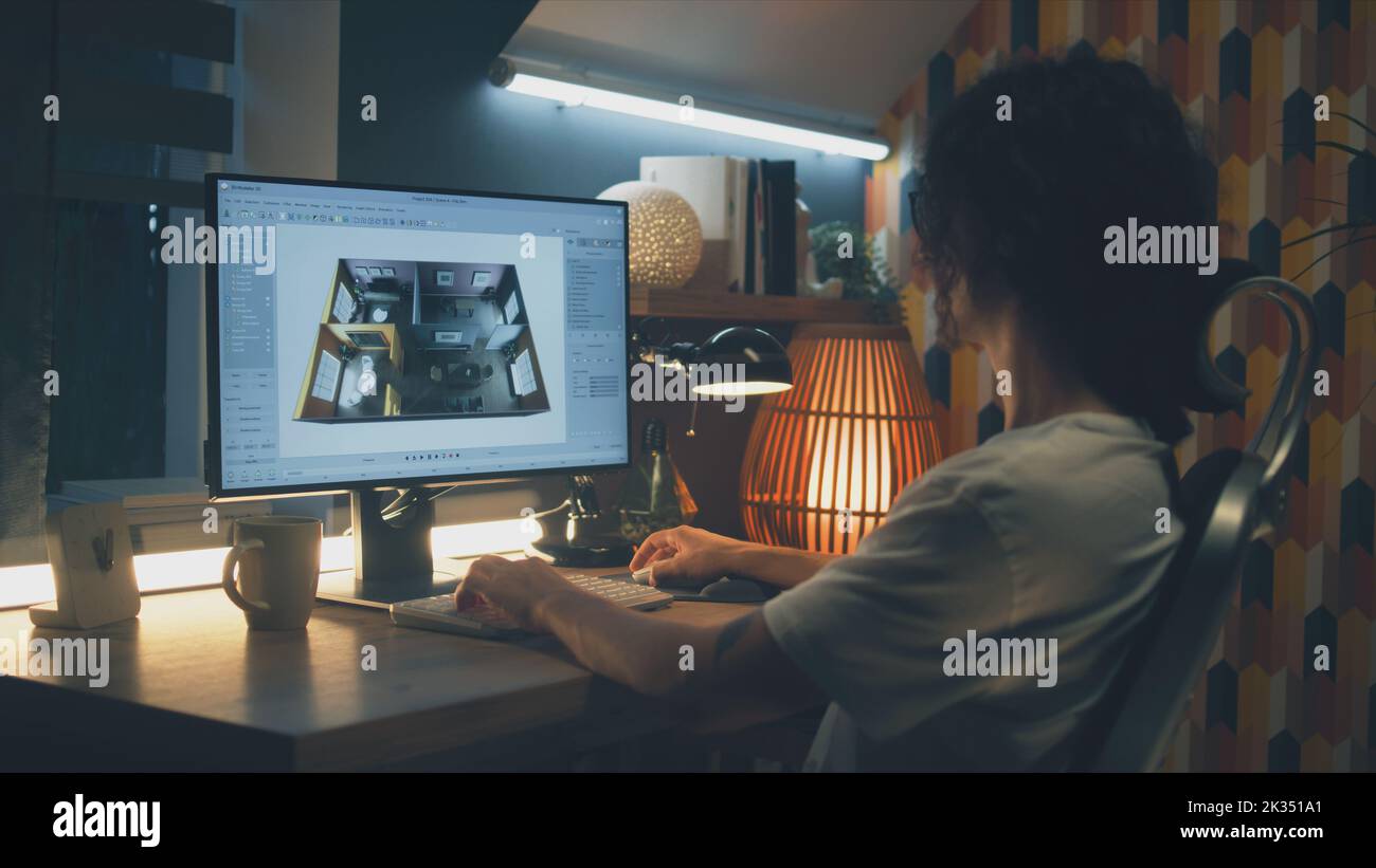 Male young designer making 3D visualization of house interior in