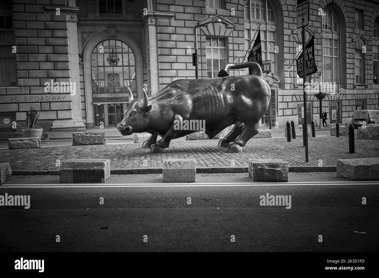 Charging Bull is a popular tourist destination that draws thousands of people, symbolizing Wall Street and the Financial District. Stock Photo