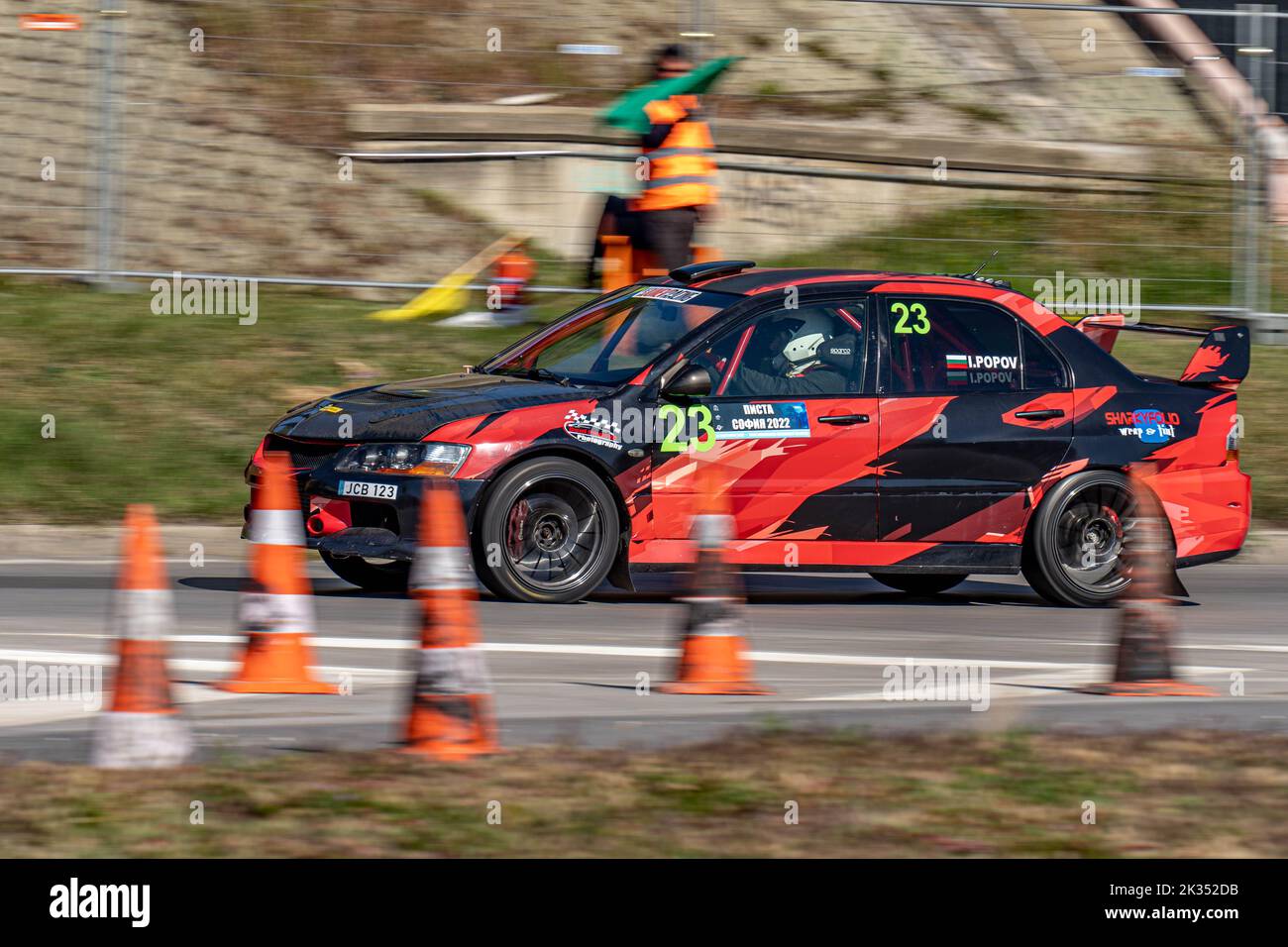 Sofia Rally -red racing car moving fast at auto racing competition in ...