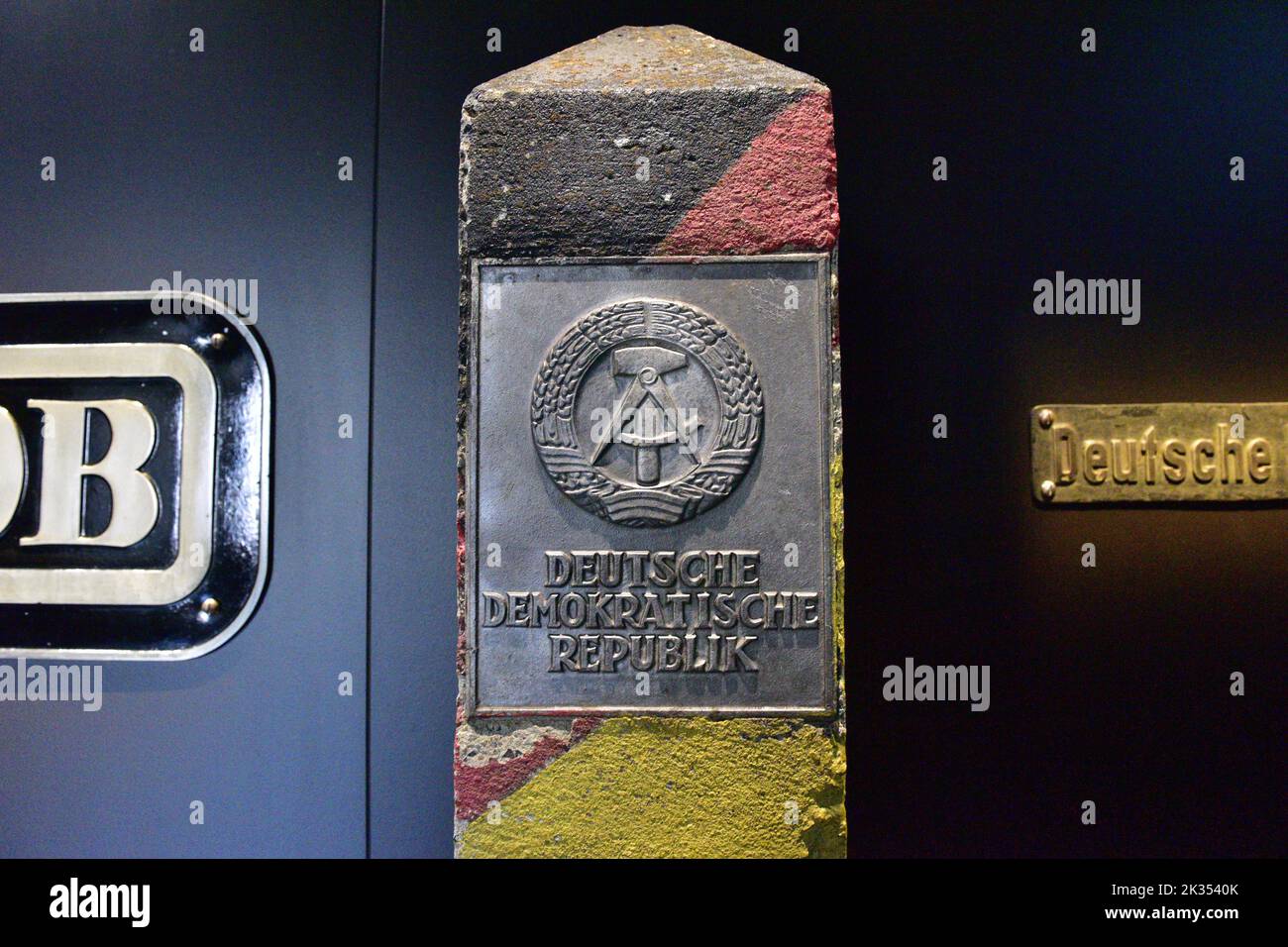 Museum of the Deutsche Bahn in Nuremberg, Bavaria, Germany - boundary stone to the former GDR Stock Photo