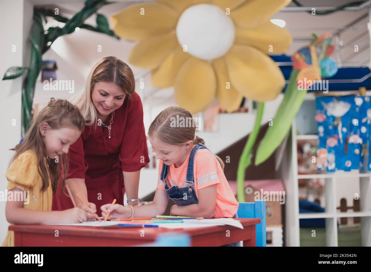 Creative kids during an art class in a daycare center or elementary ...