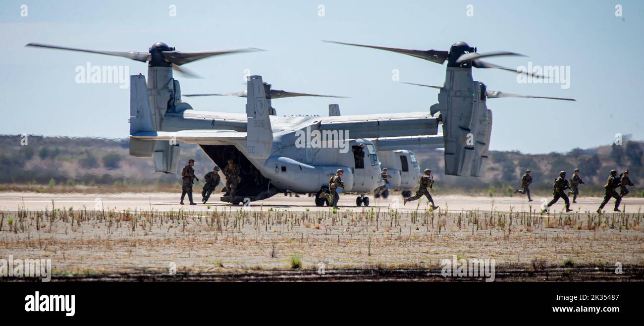 U.S. Marines with 3rd Battalion, 5th Marines, 1st Marine Division, provide ground security during the Marine Air-Ground Task Force demonstration of the 2022 Marine Corps Air Station Miramar Air Show at MCAS Miramar, San Diego, California, Sept. 23, 2022. The MAGTF Demo displays the coordinated use of close-air support, artillery and infantry forces, and provides a visual representation of how the Marine Corps operates. The theme for the 2022 MCAS Miramar Air Show, “Marines Fight, Evolve and Win,” reflects the Marine Corps’ ongoing modernization efforts to prepare for future conflicts. (U.S. Ma Stock Photo