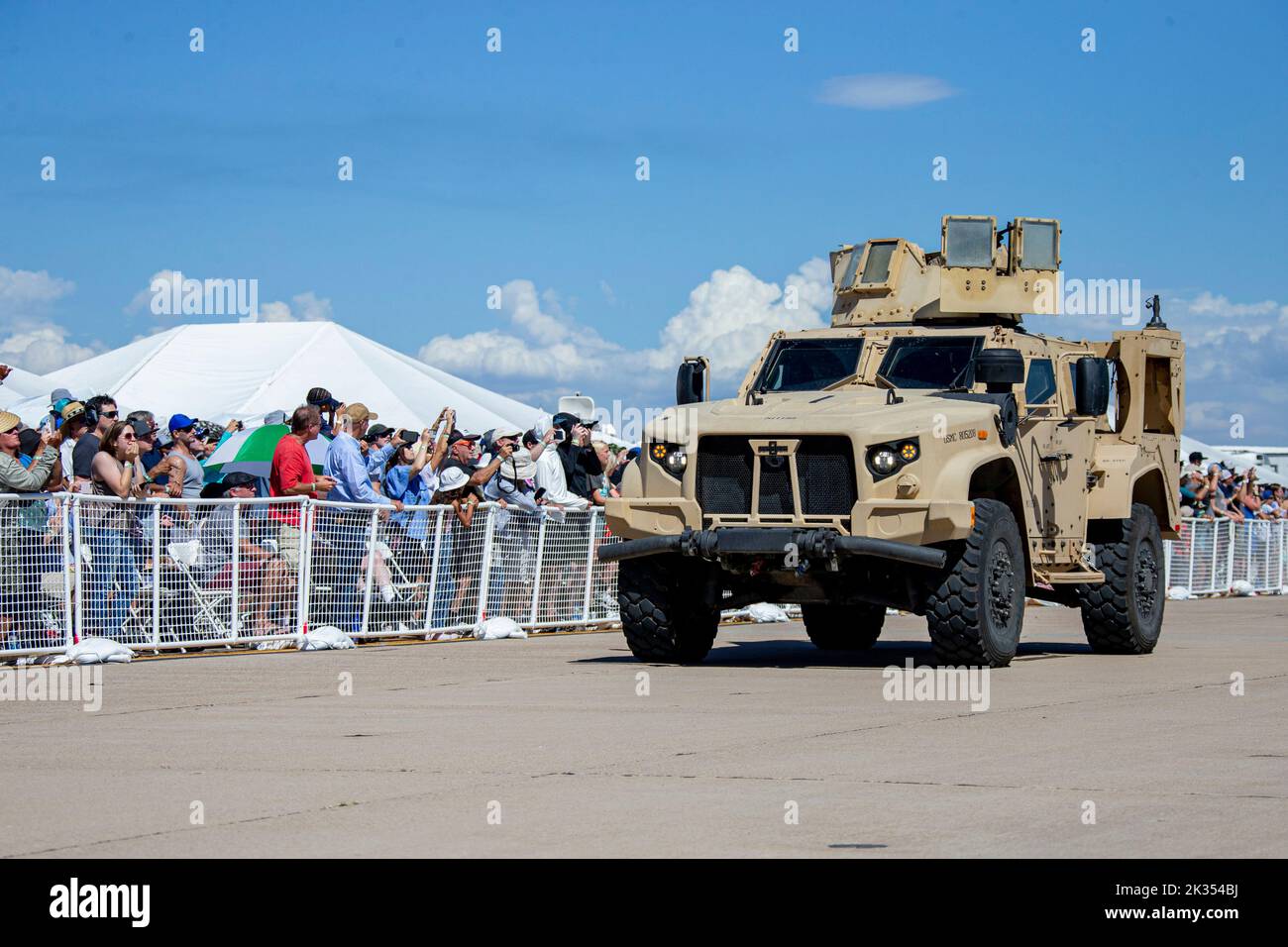 Audience members watch the MAGTF demonstration during the 2022 Marine Corps Air Station Miramar Air Show at MCAS Miramar, San Diego, California, Sept. 23, 2022. The theme for the 2022 MCAS Miramar Air Show, “Marines Fight, Evolve and Win,” reflects the Marine Corps’ ongoing efforts to modernize the force for future conflicts. (U.S. Marine Corps photo by Lance Cpl. Zachary Larsen) Stock Photo