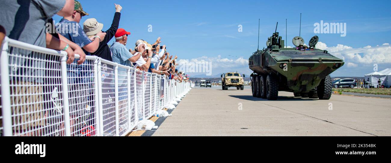 Audience members watch the MAGTF demonsration during the 2022 Marine Corps Air Station Miramar Air Show at MCAS Miramar, San Diego, California, Sept. 23, 2022. The theme for the 2022 MCAS Miramar Air Show, “Marines Fight, Evolve and Win,” reflects the Marine Corps’ ongoing efforts to modernize the force for future conflicts. (U.S. Marine Corps photo by Lance Cpl. Zachary Larsen) Stock Photo